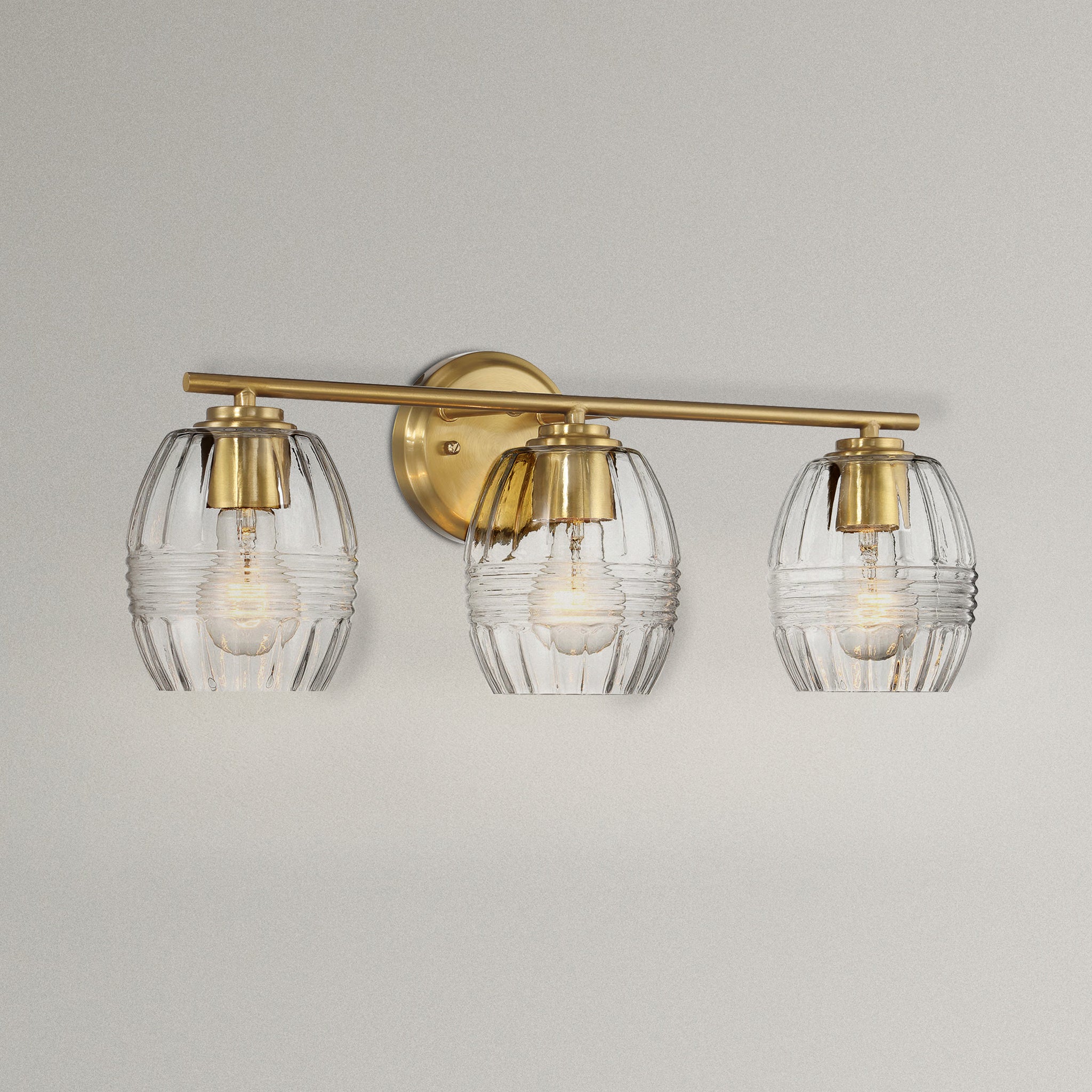 Glimmer Three Lights Vanity With Clear Glass for Bathrooms above Mirror Wall Lamp - Satin Brass