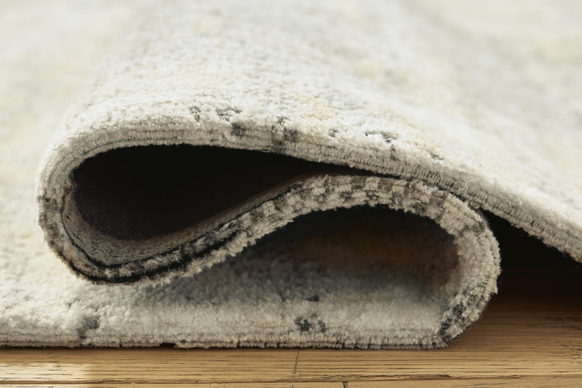 Raif Area Rugs