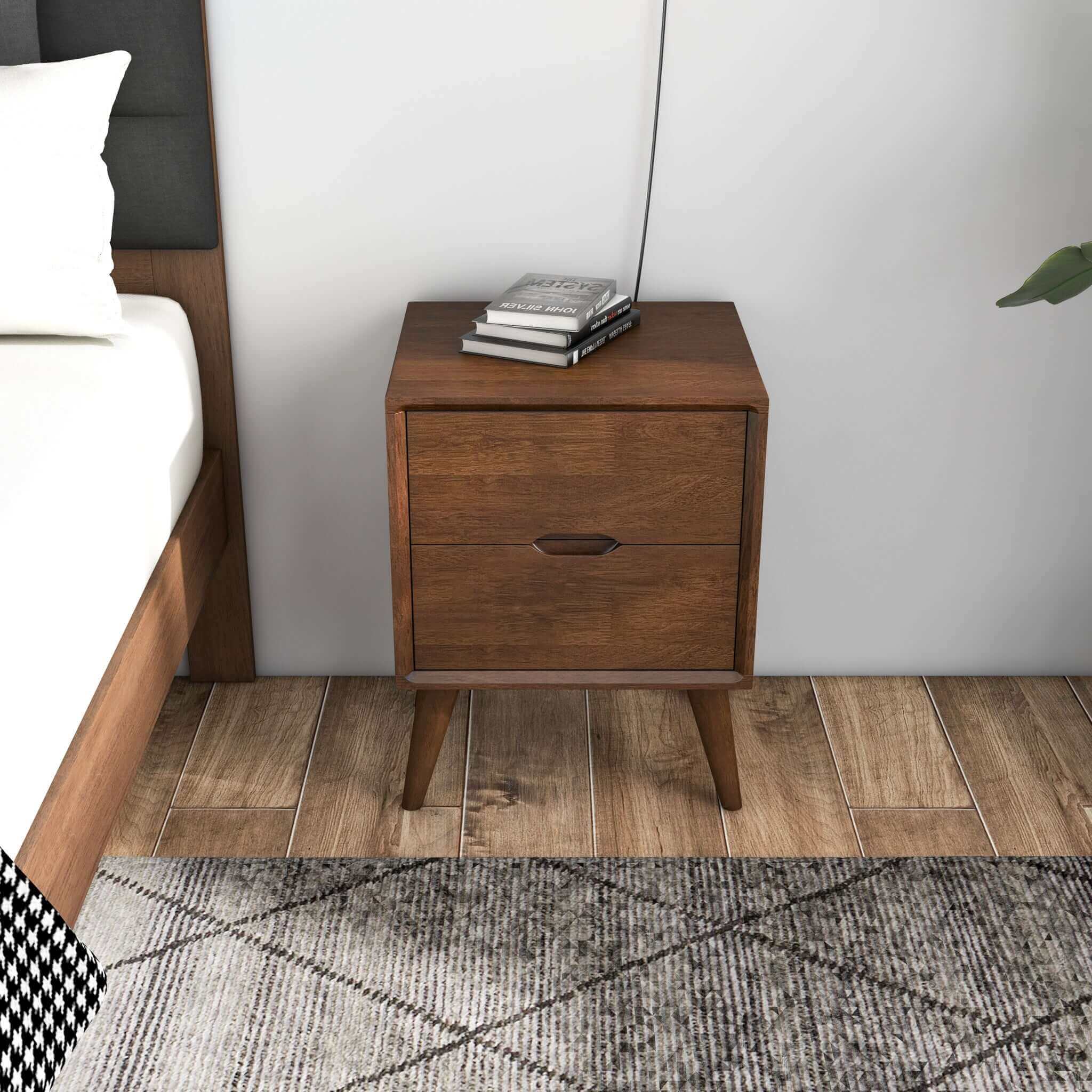 A brown walnut nightstand with two drawers and beveled edges, featuring a modern design with splayed legs.