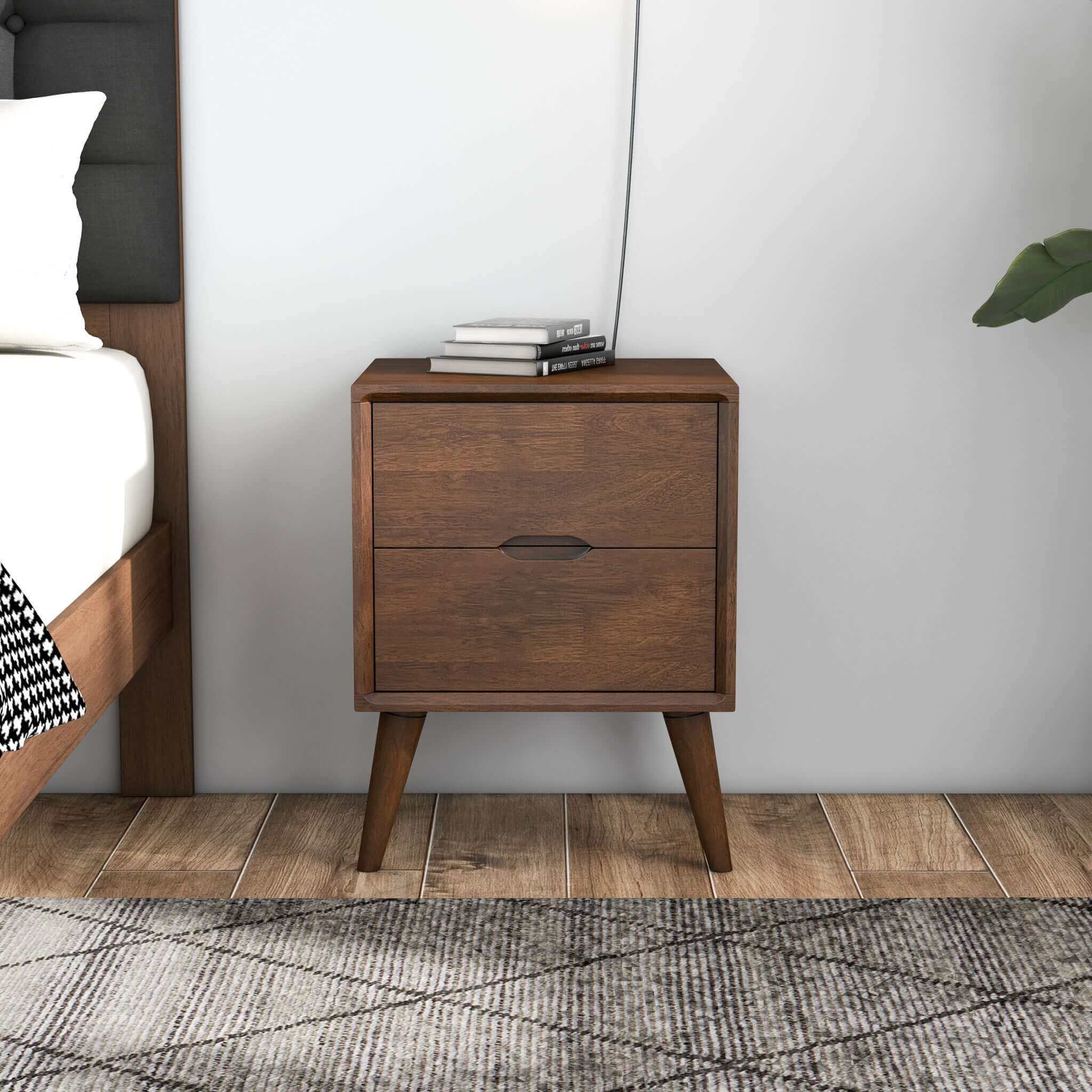 A brown walnut nightstand with two drawers and beveled edges, featuring a modern design with splayed legs.
